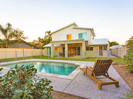 Residential house with swimming pool in the backyard